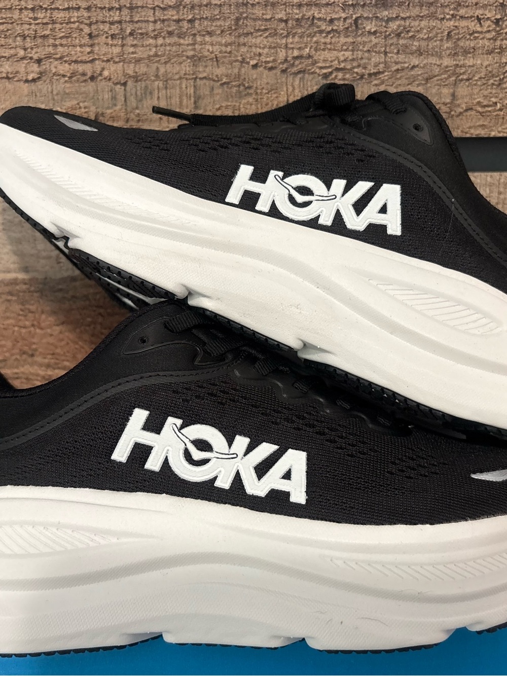 Hoka women’s size 8.5b Black and White Cushioned Running Sneakers